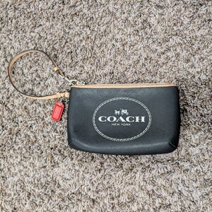Coach Black and Tan Wristlet with Red Tag